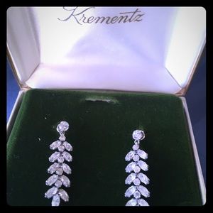 Krementz Rhinestone drop earnings.